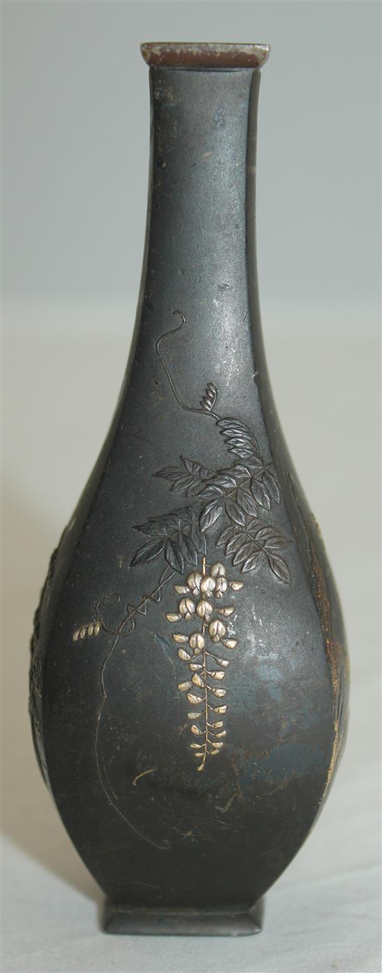 A small Japanese bronze and mixed metal square baluster vase, 10.7cm